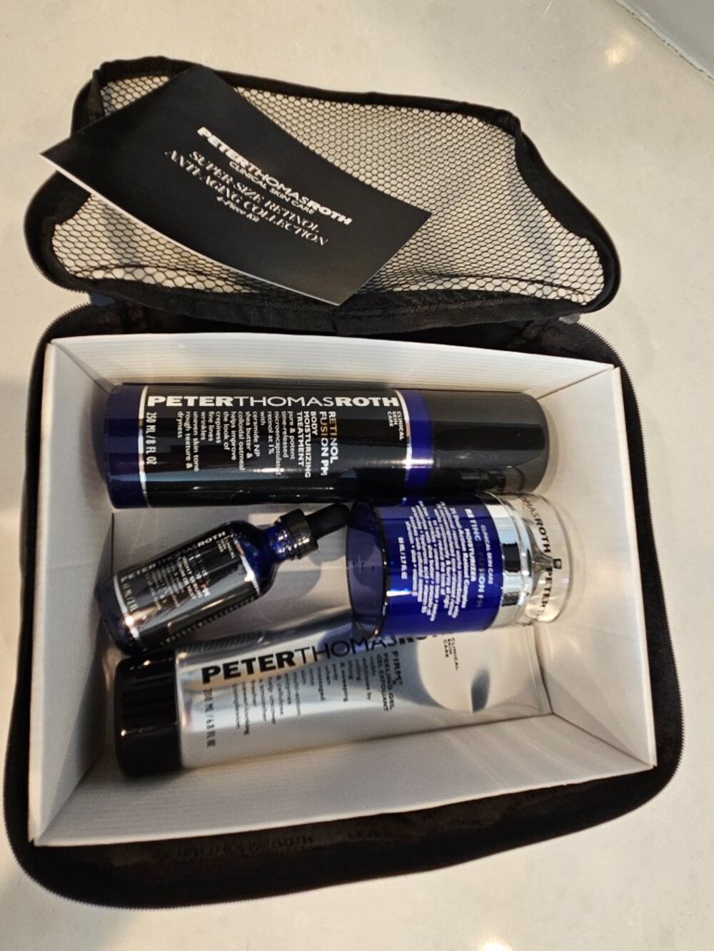 Peter Thomas Roth 4-Piece Set Retinol Fusion PM Face, Body + Firmx Peeling Gel - Picture 2 of 5